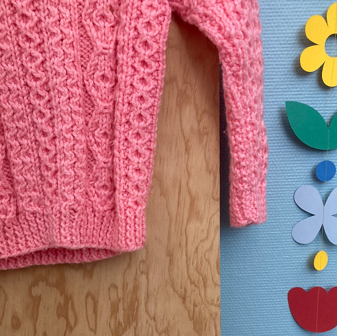 Pull tricot rose