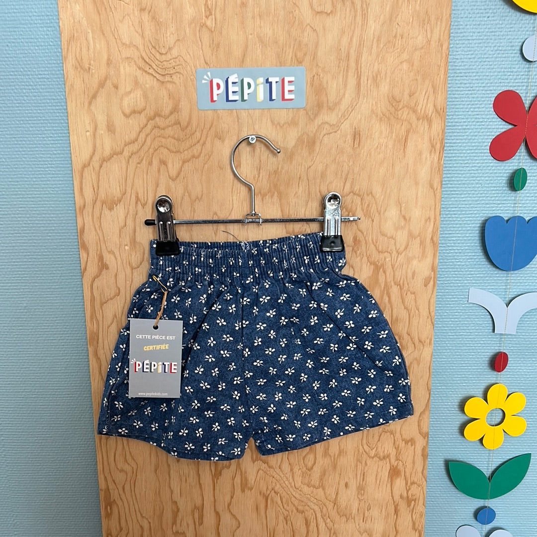 Short denim à fleurs